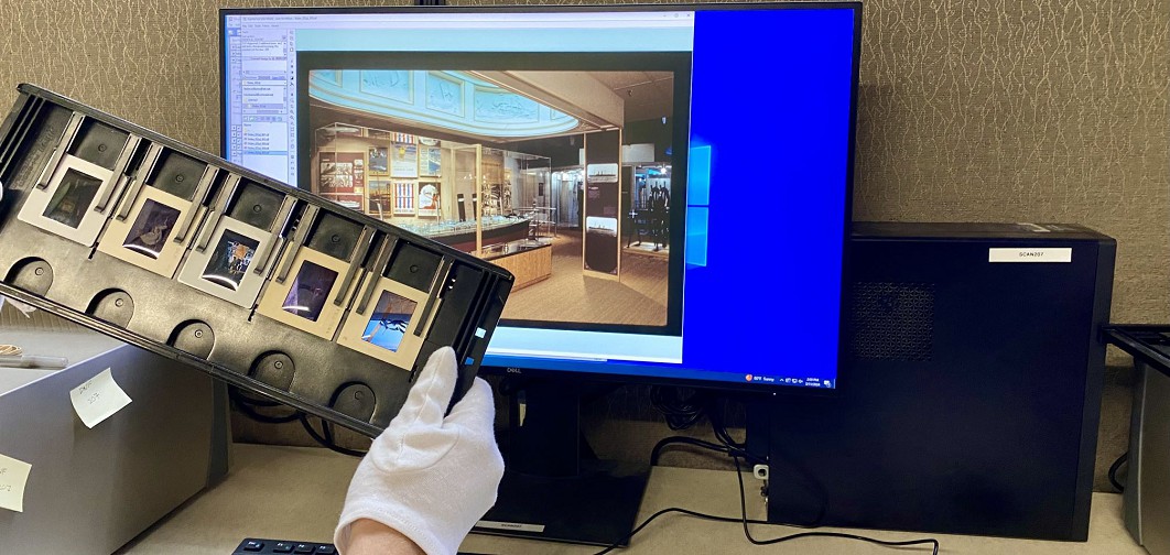 Photo scanning service technician at work on digital slides